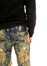 Load image into Gallery viewer, Ripped and Patched Rust Denim Shorts
